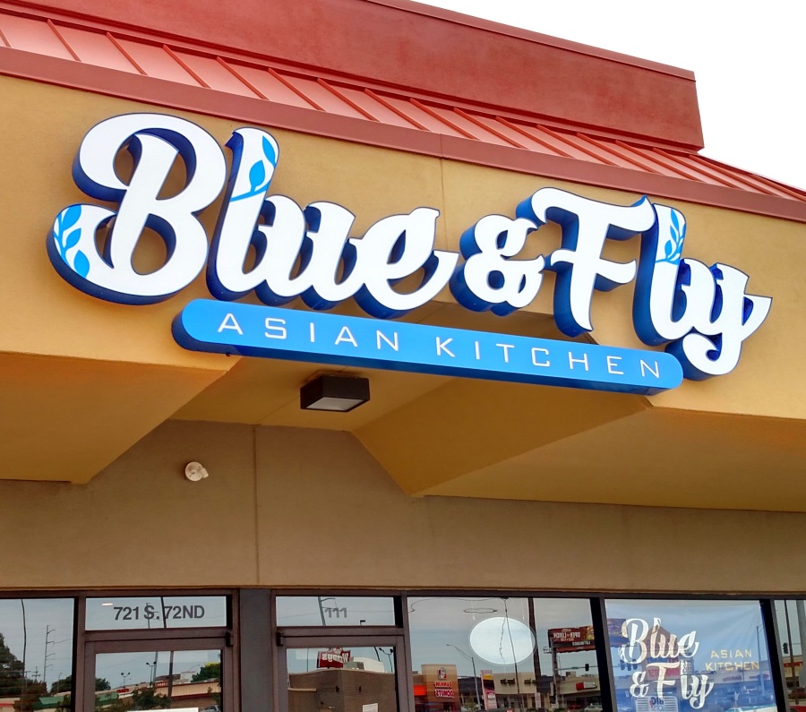 Illuminated channel letters and cabinet for Blue & Fly
